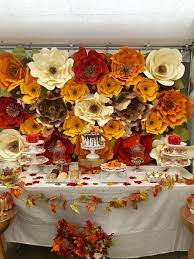 If you're looking for a great fall event theme, all you really have to do is pick a seasonal food, concept, or activity and run with it. Fall Theme Paper Flower Backdrop Styled By Whimsical Events By Abby Co Giant Paper Flowers Diy Fall Party Themes Pink Baby Shower Decorations