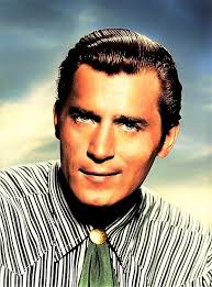 I always thought of Clint Walker as resembling Christopher George.