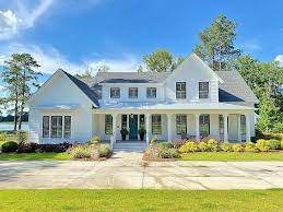 Recently Sold 1 125 000 2017 Southern Living Showcase Home The Whiteside Farm House Offers Luxury Living Southern Living Homes Lake House Plans Lake House