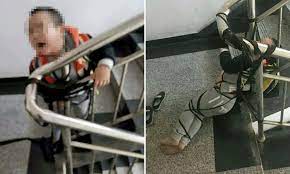 Son ties up mom