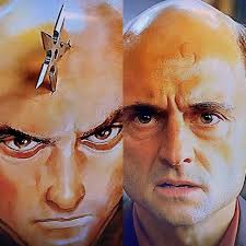 Kick Ass- 2010) When Mindy/Hit Girl throws a shuriken at the painting of  Frank D'Amico it creates an indentation similar to the scar seen