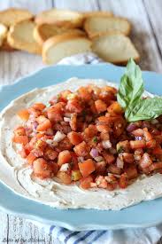 After you have mixed your ingredients together, you drop the cheese mixture onto a large piece of plastic wrap and roll it up tightly into a ball. Creamy Bruschetta Dip Belle Of The Kitchen
