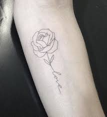 Blackwork rose stem tattoo inked on the right forearm. Pin By Zoie Smith On Tattoo Inspiration Rose Tattoos Tattoos Word Tattoos