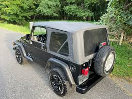 Image result for Brilliant Black 2003 Jeep