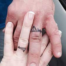 Harry Potter Ring Tattoo Meaning Always Wedding Band Tattoo Tattoo Wedding Rings Wedding Tattoos