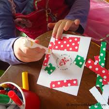 If making christmas decorations from recycled materials isn't your thing, but you don't want to throw those old cards in the trash, recycling christmas cards is the way to go. Kids Christmas Craft A Christmas Card Crafting Station B Inspiredmama Com