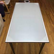 Stylifing dining table and chairs set round clear glass top crisscrossing chrome metal legs kitchen table and 4 sled based grey faux leather chairs dining set home kitchen office waiting room use. Frosted Glass Table Tops Frosted Tempered Glass Tabletops Acid Etched Glass Tabletops