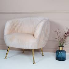 The leg colour in the product image is in the black. Marilyn Blush Velvet Armchair Pink Cocktail Chair Audenza