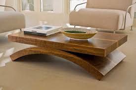This slim coffee table is notable because it brings a certain art deco vibe to your living area. Beautiful And Functional Coffee Tables Wooden Coffee Table Designs Sofa Table Design Coffee Table Furniture