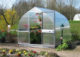This backyard diy greenhouse attaches to a wall and folds down like an awning, so you can leave it up in warm weather and lower it to protect tender plants when frost is forecast. Diy Greenhouse Kits 12 Handsome Hassle Free Options To Buy Online Bob Vila