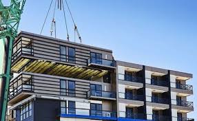 One9 Nine Story Prefab Apartment Tower Was Installed In Just Five Days Prefab Buildings Prefabricated Architecture Building Systems