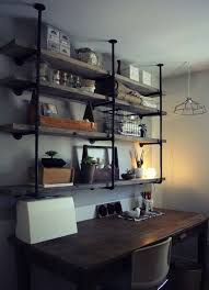 This vintage industrial wall shelf is constructed of metal pipe and wood shelves to organize and display your favorite collections of books, plants, pictures, etc. Shelves Plumbing Parts