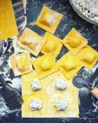 Homemade Saffron Ravioli Stuffed With Prosciutto Basil Parmesan And Ricotta Cheese Ravioli Homemade Ravioli Prosciutto
