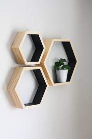 Hexagon wall shelves for retro, industrial home decor, adding a modern, comtemporary and scandi style. Black Hexagon Shelves Honeycomb Shelf Painted Hexagon Shelves Hexagon Shelf Modern Decor Honeycomb Shelves Hexagon Shelves Wall Shelves Design