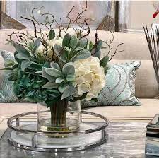 The 21'' silk composition features lillies and orchids placed in a fancy vase with three scrolled legs and a triangle base. Hydrangeas Floral Arrangement In Glass Vase Home Floral Arrangements Floral Arrangements Floral Decor