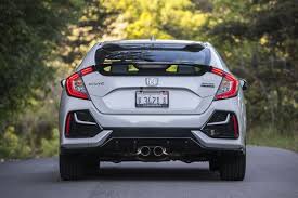 Used 2020 honda civic sport touring with fwd, navigation system, keyless entry, fog lights, spoiler, leather seats, heated seats, 18 inch wheels, alloy wheels, lane departure warning, and honda sensing. 2020 Honda Civic Sport Touring Review Specs Comparison