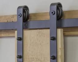 Articles Similaires A Kit De Quincaillerie De Porte Coulissante Au Milieu Du Siecle Sur Etsy Barn Doors Sliding Sliding Shutters Rustic Barn Door