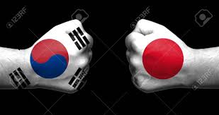 The hermit kingdom is notoriously secretive about its internal af. Flags Of Japan And South Korea Painted On Two Clenched Fists Facing Each Other On Black Background Japana South Korea Relations Concept Stock Photo Picture And Royalty Free Image Image 106223853