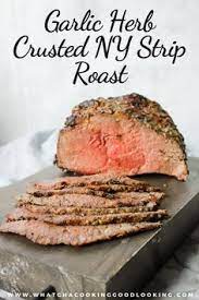 Garlic Herb Crusted New York Strip Roast Is A Delicious Family Dinner That Is Ea Cruste Delicious Family Dinners New York Strip Roast Roast Recipes