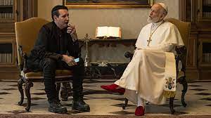No blasphemous rumors here, because marilyn. See Marilyn Manson S Funny Cameo With John Malkovich On The New Pope Revolver