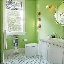 Note how the outside doors' warm wood tone fits perfectly with the lighter colors in the bathroom. Small Bathroom Chic Vibrant Colors Make Bathrooms Look Bigger Green Bathroom Green Bathroom Decor Bathroom Wall Colors