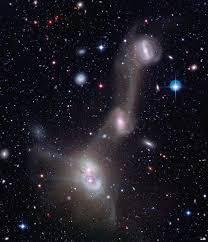 From wikimedia commons, the free media repository. These Four Spiral Galaxies In Ngc 4410 Display An Extraordinary Cosmic Spectacle Each Generating Immense Tidal Forc Galaxies Space And Astronomy Spiral Galaxy