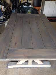 What kind of stain to use on farmhouse top? Handmade Farm House Table With Reclaimed Wood First Coat Of Grey Color Stain For A Rustic Vintage Weathe Dining Room Decor Rustic Farm Table Dining Room Table