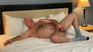 Mature man exposes his hung dick