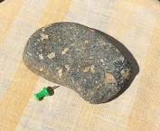 Nwa 2200 is a lunar feldspathic breccia and is composed of a diverse mixture of mineral fragments, lithic clasts, glassy clasts, and impact glass spherules . 1 111 21