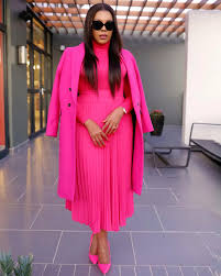Gugu Mahlangu-Kanana | Pink or green coat? Top: @foschinisa Skirt:  @foschinisa Heels: @stevemaddensa Coat: @zaratags_za | Instagram