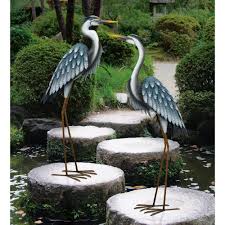 It's an oasis where you can plant, plow, and harvest. Regal Large Blue Heron Metal Garden Statuary Looking Down 11781 The Home Depot Garden Statues Organic Gardening Garden