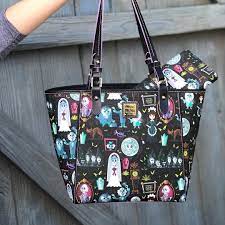 Mvplanners On Instagram New Haunted Mansion Dooney And Bourke Collection Was Released Today In Disney P Dooney And Bourke Disney Dooney Bourke Disney Purse
