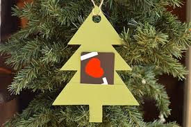 You can decorate the paper bag and then tie it with a simple string or twine. Hanging Tree Gift Card Holder