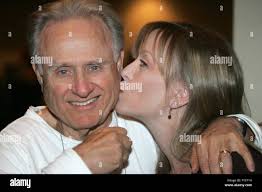 HBO announcer Larry Merchant and Golden Boy publicist Debbie Kaplan clown  around before the Manny Pacquiao and Juan Manuel Marquez weigh in for their  fight at Mandalay Bay