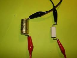With the capacitor out of the circuit, set your multimeter on the highest ohms range. Capacitors 101 Ifixit