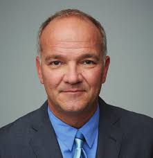 ROBERT W. PERRIN MARVIN S. PUTNAM