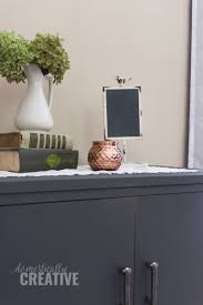 Find a spot that is away from your house, but that you know your cat will use. Diy Litter Box Cabinet Domestically Creative