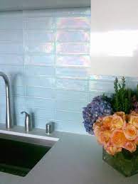 A blue backsplash tile surface, for instance, can be used in rooms with a beach or country theme. Kitchen Update Add A Glass Tile Backsplash Hgtv