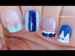 Black and white studded nail art design. 4 Winter Nail Art Designs In Sparkly Blue White Silver Lifeworldwomen Youtube