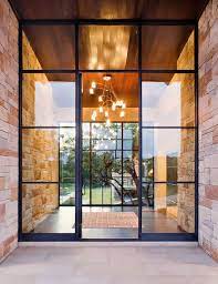 Toughened glass doors from the glass warehouse provide a safe, sturdy and stylish solution for interior doors in your home or office, and can provide a number of advantages including Spanish Oaks Contemporary House Door Design House Design Modern House Design
