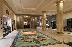 How About This For An Entrance Marble Columns And Floors Adorn Our Lobby Area Fairmontdallas Dallas Hotels Hotel Packages Destin Hotels