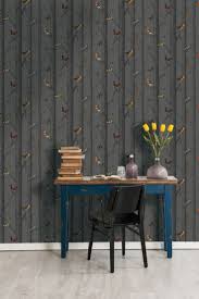 Colourful Birds And Butterflies Wallpaper Wallpaper Design Featuring A Pattern Of Monochrome Tree S And Vibrantly Coloured Birds Arredamento Carte Da Parati Parete