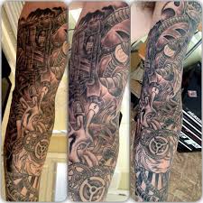 Mechanical tattoos such as biomechanics beetle tattoos; Oneshottattoos Com