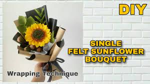 Dia juga memiliki warna kuning yang identik dengan arti kehangatan dan kebahagiaan. Diy Membuat Buket Bunga Matahari Single How To Wrap Single Felt Sunflower Bouquet Youtube