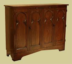 We make cabinet door tvs with 3 types of the front finish: Oak Tv Cabinet Gothic Style With Bi Fold Doors