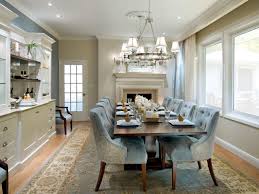 Dining room with wood burning stove, floor to ceiling sliding doors to deck. Turn An Empty Space Into A Divine Dining Room Hgtv