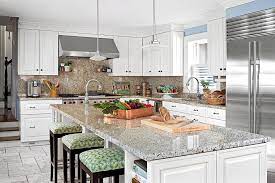It has a small sink as well as three chairs. Our Favorite Kitchen Island Seating Ideas Perfect For Family And Friends Better Homes Gardens