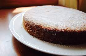 fanouropita is made on august 27th to commemorate saint fanourios the martyr and miracle worker the revealing sain recipes eggless recipes gluten free sweets
