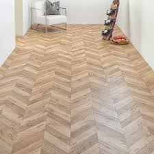 Quality wooden flooring, laminate, parquet & vinyl flooring with quick delivery across uk. Liberty Floors Chevron Parquet 8mm Natural Oak Embossed Laminate Flooring 8192 Leader Floors