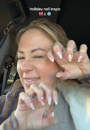 Red Nails with Snowflakes French Tip